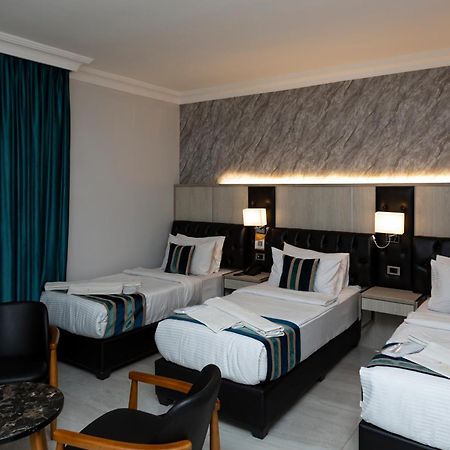 Nishan Hotel Amã Quarto foto