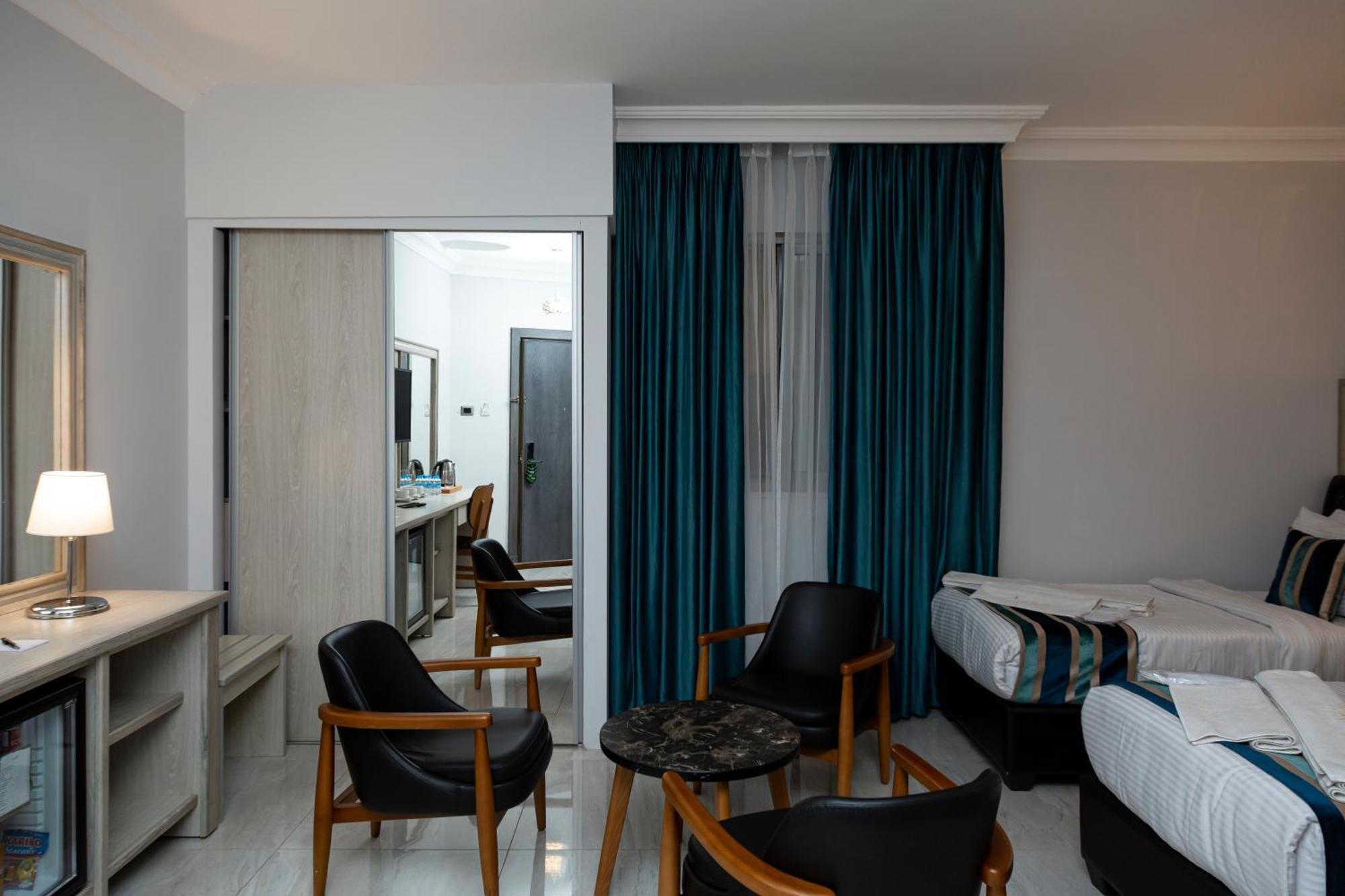 Nishan Hotel Amã Quarto foto